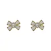 Brincos de pérola com laço branco super fada mini brincos pequenos para mulheres brincos ins retrô de luxo leve para mulheres