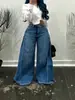 Calças jeans largas europeias e americanas transfronteiriças para mulheres, calças boca de sino patchwork azul lavado Y2K, calças compridas largas para mulheres