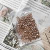 Broca de uñas Fantasma de la Ópera dorada al por mayor con forma de vidrio champán fondo plano broca red de amor broca gota de agua decoraciones de uñas