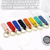 Llavero de piel sintética para hombre y mujer etiqueta de piel de doble cara placa de nombre llavero llavero colgante venta al por mayor logo personalizable
