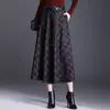 Elegante falda midi de cuadros en línea A para mujer, nueva colección otoño 2026, de cintura alta, que cubre la cadera, elegante, versátil y con un dobladillo ancho
