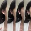 Pendientes de botón de perla S999 plateados por todas partes para mujer, sencillos y elegantes, pendientes de lujo ligero de alta gama, nuevo modelo popular 2026