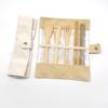 Conjunto de produtos de bambu Conjunto de faca, garfo e colher de bambu Conjunto de pauzinhos de palha de bambu Bolsa de pano Logotipo esculpido Palha de bambu