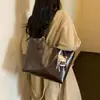 Bolso Retro de Gran Capacidad para Mujer 2026 Nuevo Bolso de Hombro Casual para el Trabajo y el Viaje Bolso Tote Texturizado Simple Versátil