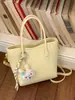 Bolso pequeño de moda más vendido para mujer, nuevo bolso cruzado versátil de moda 2026 para el trabajo y los desplazamientos, bolso de mano tipo cubo