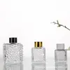 Em estoque: Frascos de fragrância em formato quadrado, frascos de vidro tipo cubo d'água, frascos vazios para aromatizadores de ambiente de hotel e frascos vazios para fragrância caseira