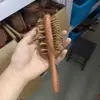 Venta al por mayor desde la fábrica de origen: Peine de masaje de sándalo con pequeñas imperfecciones, peine con cojín de aire, peine de masaje de meridianos del cuero cabelludo, unisex
