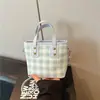 Bolso de mano de cuadros de comercio exterior para mujer, nuevo y moderno bolso tote de moda 2026, bolso de hombro cruzado tipo cubo para el trabajo