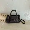 Bolsa de mão simples de design de nicho estilo coreano transfronteiriça nova moda 2026 bolsa de ombro casual bolsa transversal para o dia a dia
