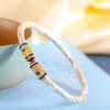Pulsera de plata de moda popular, pulsera de pie de plata 999 con hierba de oro trazado, pulsera de plata de contraparte sólida Tang Grass