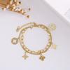 Explosiones Transfronterizas Pulsera de Hilo con Borla de Trébol de Cuatro Hojas Doradas para Mujer Moda Japonesa y Coreana Pulsera de Flor Prismatic
