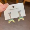 Pendientes colgantes de circonita cúbica en forma de corazón, de lujo ligero y versátiles, con un diseño único y un aspecto sofisticado y elegante, al por mayor