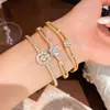 Pulsera de flor de circón chapada en oro real de 18K, lujo ligero, alta gama, moderna y exquisita, diseño único, joyería de nicho