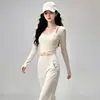 Conjunto de yoga para mujer, con un top ligero y transpirable de manga larga y leggings deportivos de secado rápido, perfecto para correr, entrenar y yoga