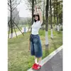 Pantalones cortos de mezclilla retro a cuadros tipo americano con retazos para mujer, nuevo diseño de primavera 2026, shorts holgados de pierna ancha