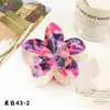 Nuevo Clip de Huevo con Flores Qiyue Moda Impresión UV Pasador de Orquídea Florale Clip de Tiburón Creativo Europeo y Americano