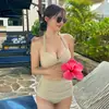 Nuevo en stock Bikini triángulo de color sólido europeo y americano Traje de baño dividido transfronterizo Venta al por mayor Traje de baño sexy para damas bikini