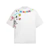 Chegada Nova 2025 Estilo Americano Marca de Moda Criativa Estampa Graffiti de Desenho Animado Camiseta de Manga Curta para Homens e Mulheres High Street Casal Gola Redonda Manga Curta