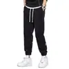 Pantalones de Chándal para Hombre Transfronterizos Sueltos para Hombre Otoño Nuevo Estilo Pantalones Casuales Marca Tendencia Juvenil Versátiles Deportivos Pantalones con Cordón para Hombre
