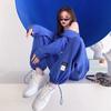Traje de celebridad de internet tipo waffle para mujer, estilo europeo y americano, moda transfronteriza, color sólido, chaqueta corta con capucha, pantalones deportivos, conjunto de dos piezas