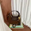 Bolso de media luna minimalista de moda transfronterizo, bolso redondo pequeño versátil elegante de alta gama, bolso cruzado tipo dumpling moderno personalizado de lujo ligero