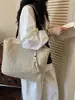 Bolso tejido de paja de gran capacidad para mujer, nuevo modelo 2026, versátil para ir al trabajo, bolso tejido de mano y al hombro, bolso de playa para vacaciones en la costa