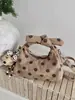 Bolso de mano de lunares de nicho estilo coreano transfronterizo para mujer, nuevo 2026 súper popular, bolso versátil de moda para hombro y cruzado