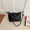 Comércio exterior transfronteiriço, bolsa de ombro feminina tecida minimalista 2026 nova coleção de outono, estilo coreano para o dia a dia, bolsa de ombro requintada em formato de bolinho