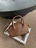 Bolsa de mão feminina de couro bovino curtido vegetal de primeira camada transfronteiriça, bolsa transversal para o dia a dia, bolsa sela pequena e leve, bolsa concha