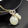 Estilo étnico hermoso significado bolsa de la suerte y la fortuna colgante imitación Jade Hetian diamante de amor hebilla colgante de bolsillo