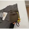 Moda de Tendencia Nueva Primavera y Verano 2025 Bolso Cubo Nicho Patrón Granulado Color de Contraste Bolso de Hombro Bolso Cruzado Súper Popular