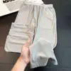 Calça casual de seda gelada com bordado em espinha de peixe na cintura para homens, estilo americano outonal, texturizada, respirável, calça esportiva fitness elástica.