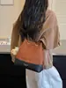 Bolso moderno y a la moda, sensación de nicho de alta gama, bolso de axila para mujer, nuevo bolso de hombro retro versátil para mujer otoño 2026