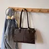 Bolsas de mano para mujer transfronterizas, nueva colección de principios de invierno 2026, bolsos tote, bandoleras y bolsos cruzados modernos y de moda