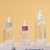El Fabricante Xingbo Tu Tiene en Stock Botellas de Vidrio de 30 ml, Materiales Personalizables de Empaque para Cosméticos y Cuidado de la Piel de 100 ml, Botellas Redondas de Hombro para Aceites Esenciales