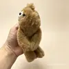 Pulseira de Ursinho Fofa e Macia Tipo Tapa Brinquedo de Pelúcia Boneca Urso Deitado Presente Poliéster Feito à Mão