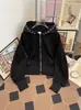 Ventas Directas de Fábrica Otoño Nuevo Diseño de Nicho Americano Chaqueta Corta con Capucha de Perlas para Hombre Chaqueta Negra Retro