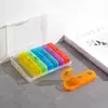Caja de Medicamentos Portátil Pequeña con Múltiples Compartimentos de Amazon Transfronteriza Que Puede Usarse Durante Una Semana y Se Puede Dividir en Siete Días. Caja de Medicina Portátil