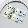 Oso de Línea Lindo Simple Sonriente Combinación de Colores Uñas Lindas Postizas para Niños Venta al por Mayor