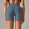 Pantalones de yoga de estilo nuevo sin línea de vergüenza color piel para mujer, cintura alta, realce de glúteos, compresión abdominal, shorts deportivos de tres puntos