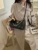 Bolso hobo cadena estilo 2026 inspirado en Chanel con patrón de diamantes, bolso de hombro de cuero encerado retro, bolso tote versátil
