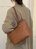 Bolso tote único, simple, elegante y de alta calidad, nuevo modelo de verano 2026, color liso, de nicho, casual, bolso de hombro de alta apariencia, moderno