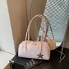 Moda Transfronteriza Versátil Exquisito Diseño de Nicho Verano 2026 Nuevo Bolso Baguette de un Solo Hombro para el Trabajo de Alta Gama