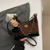 Bolso de Hombro con Cadena Texturizada para Mujer 2026 Nuevo Bolso Cruzado de Gran Capacidad Versátil Bolso Hobo para el Trabajo Bolso de Hombro Único Moderno