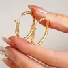 Pendientes de Aro Grandes Dorados Retorcidos, Accesorios de Moda para Orejas con Clip, Nuevo Estilo Versátil para el Día a Día 2026