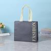 Bolsa de tela no tejida recubierta en stock bolsa de embalaje para ropa hecha a medida bolsa de mano no tejida para ropa infantil hecha a medida logo personalizado