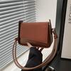 Estilo coreano Retro Texted 2025 Início da primavera Nova moda casual Grande capacidade Cor sólida Ombro Crossbody Bolsa de axila para mulheres