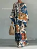Conjunto de Duas Peças Moda Casual Elegante Estampado Novo Estilo Transfronteiriço Camiseta de Gola Redonda Manga Longa + Calça Flare para Mulheres