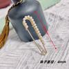 Broche con hebilla de perla, pasador, hebilla de cintura, luz anti-corrida, accesorios de ropa fijos, cambio de cintura, pequeño artefacto, pasador, pasador de cintura para pantalones