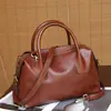 Bolso de mano de cuero genuino, bolso tipo bowling de nicho para mujer, bolso Boston tipo almohada moderno y versátil, bolso cruzado de diseño casual